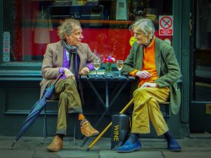 Two old guys gossiping